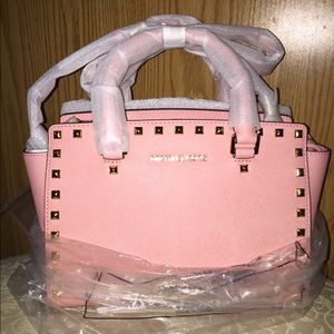 Michael Kors pink studded leather satchel bag